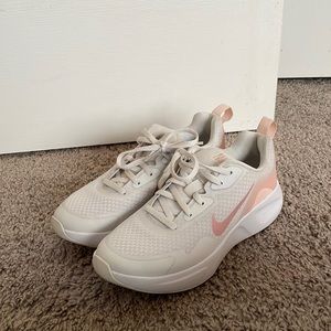 Pink & white Nike women’s sports shoes used